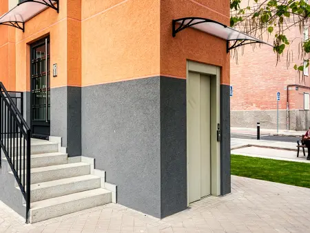  Residential building with a retrofitted elevator 