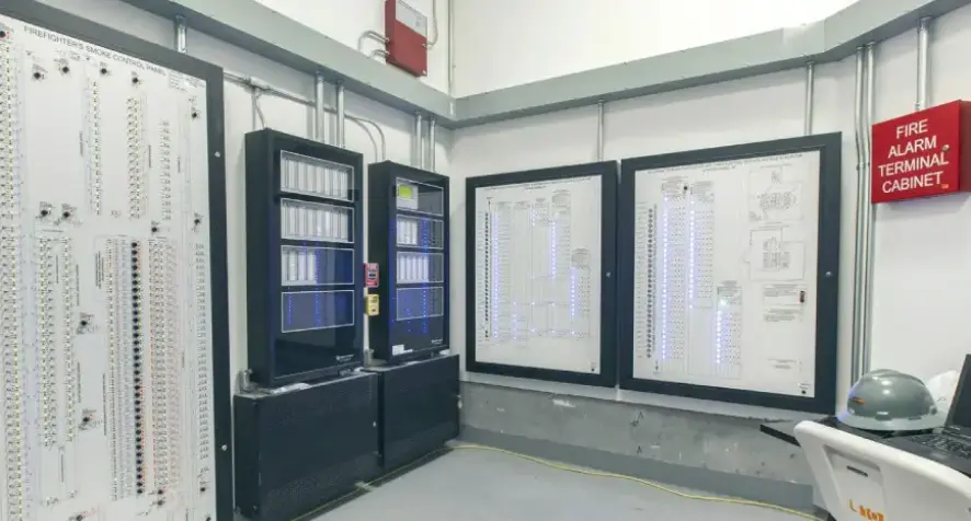 Control room with Occupant Evacuation Elevator status panels.