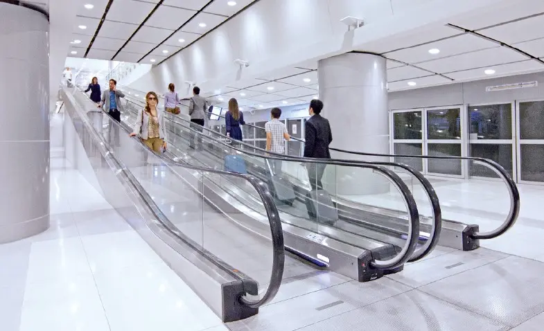 An indoor, inclined moving walk.