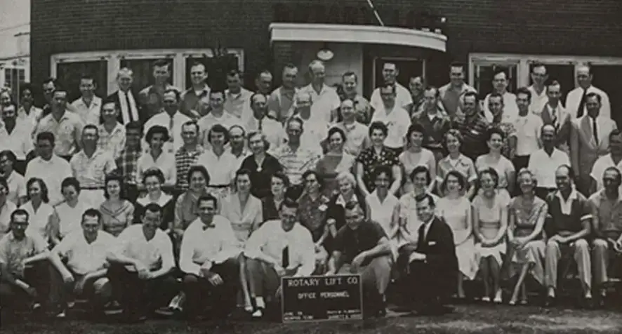 A group photo of Rotary Lift employees from 1959