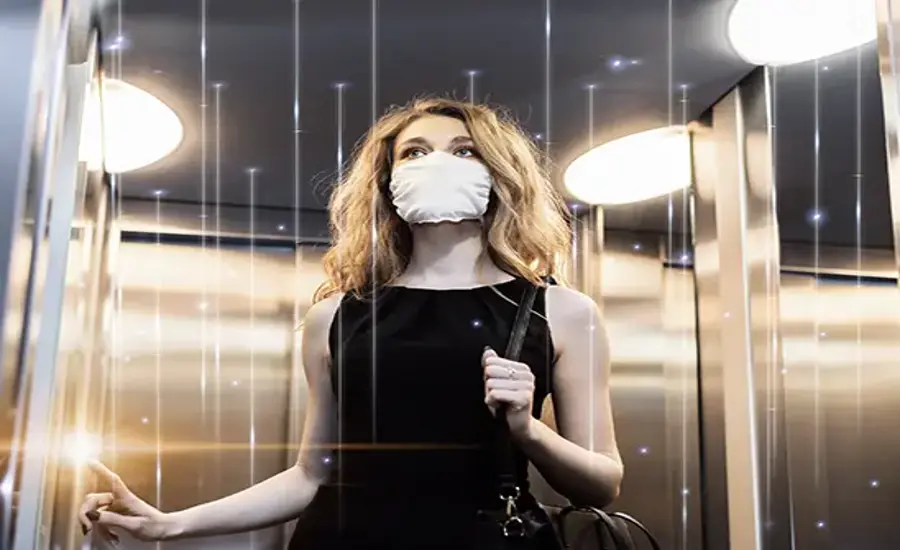 
An illustration showing air being purified in an elevator cabin.
