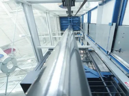A hydraulic elevator seen from below.
